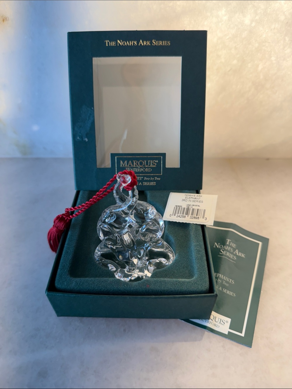 Marquis Waterford Clear and Green Elephant Ornament with Red Tassel